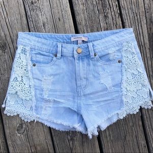 Distressed High Rise Lace Light Denim Shorts